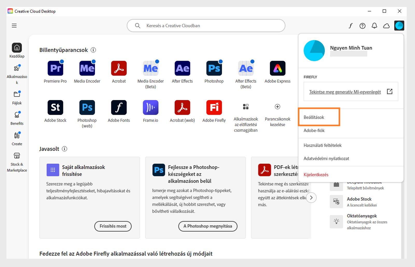 A Creative Cloud asztali alkalmazás kezdőképernyőjén megjelenik a Fiók legördülő menü a Kijelentkezés lehetőséggel. 