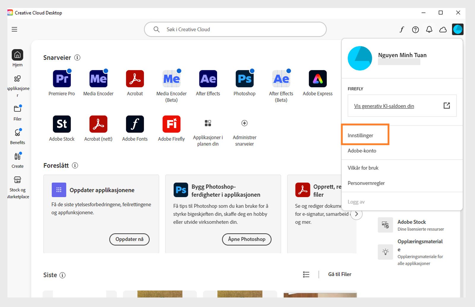 Startskjermen i Creative Cloud-appen viser nedtrekksmenyen for konto med alternativet for å Logg av. 