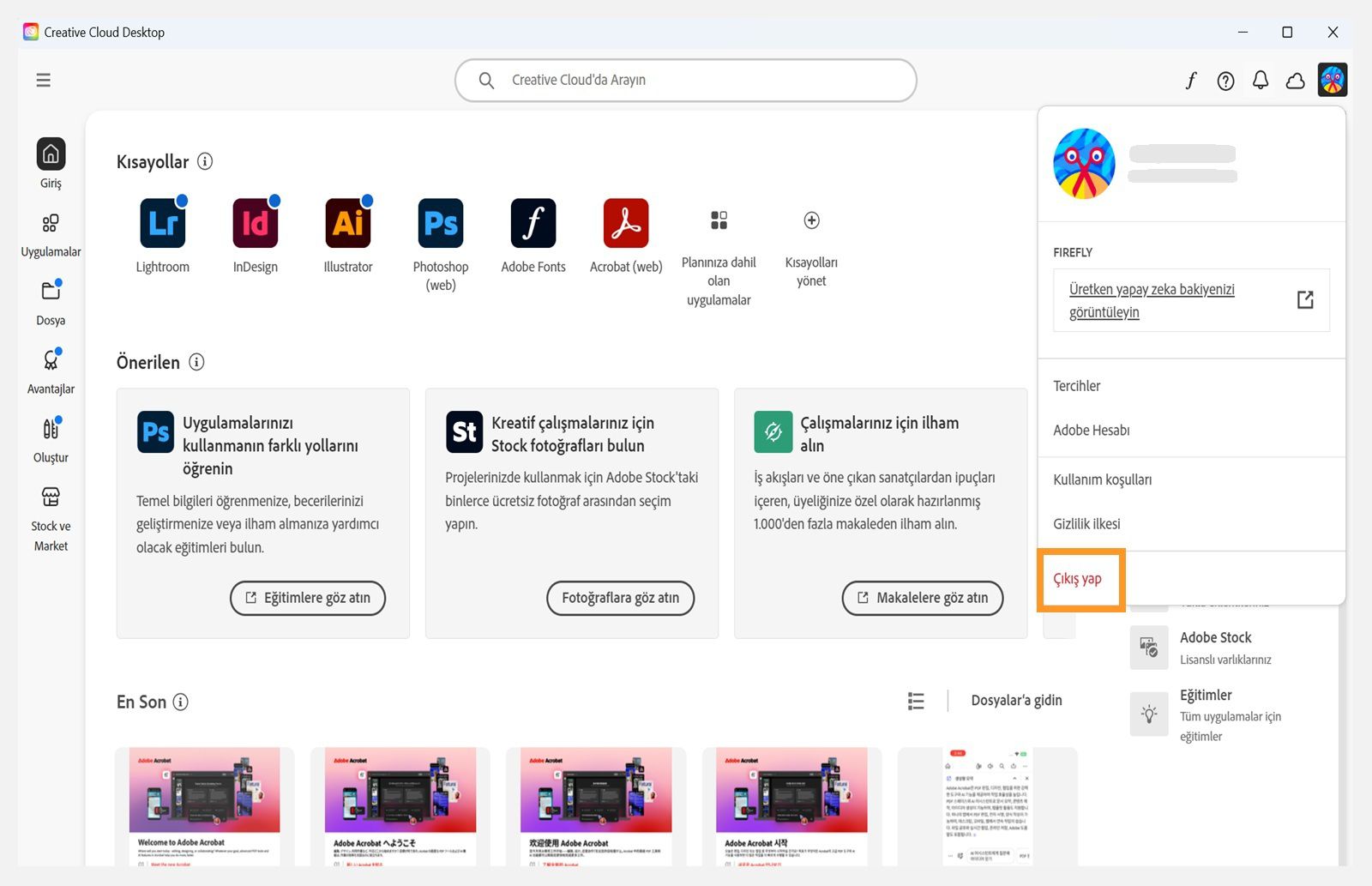 Creative Cloud masaüstü uygulamasının giriş ekranında, Çıkış yap seçeneğiyle birlikte Hesap açılır menüsü görüntülenir. 