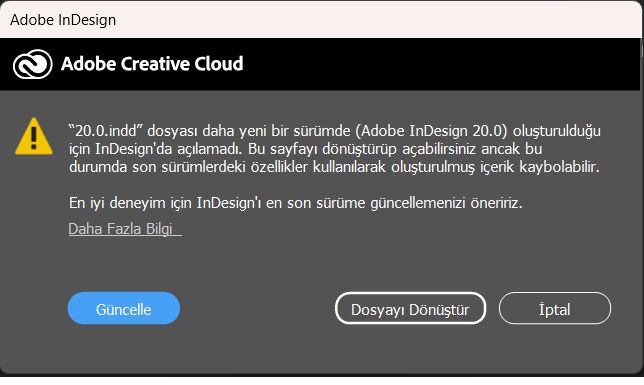 Daha yeni bir sürümde oluşturulan bir dosyayı uyumluluk için güncellemenizi veya dönüştürmenizi öneren Adobe InDesign uyarısı.