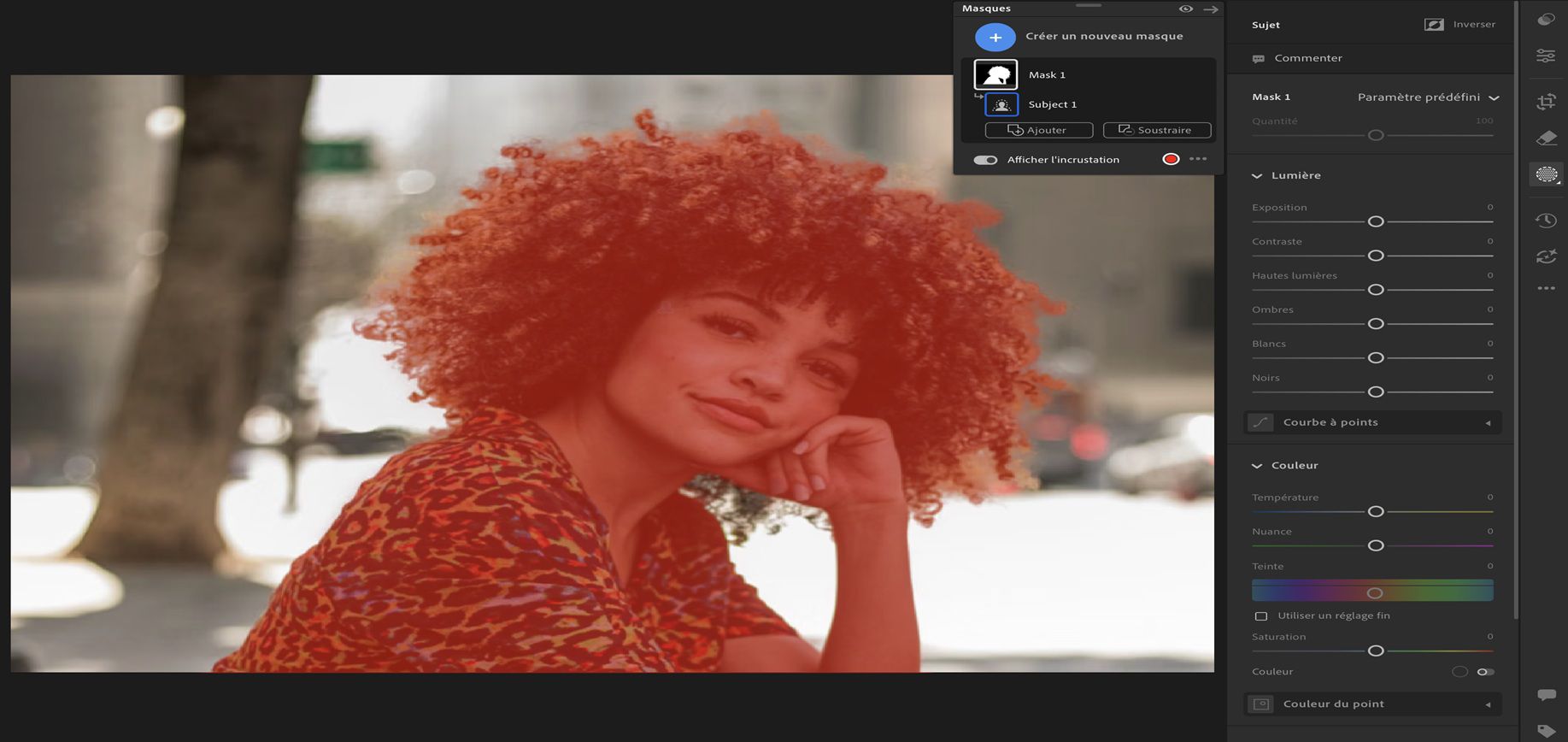 L’interface Sélectionner un sujet dans Lightroom affiche une fille aux cheveux bouclés sélectionnée comme sujet dans une photo.