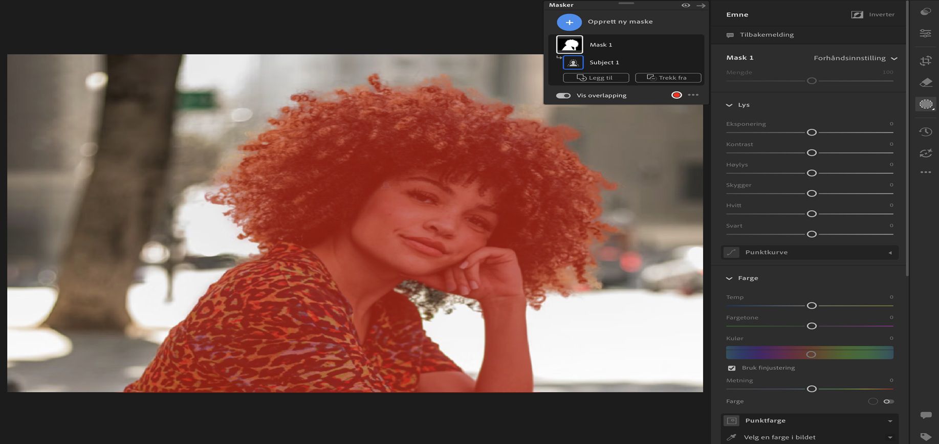 Grensesnittet for Velg motiv i Lightroom viser en jente med krøllete hår som er valgt som motivet i et bilde.