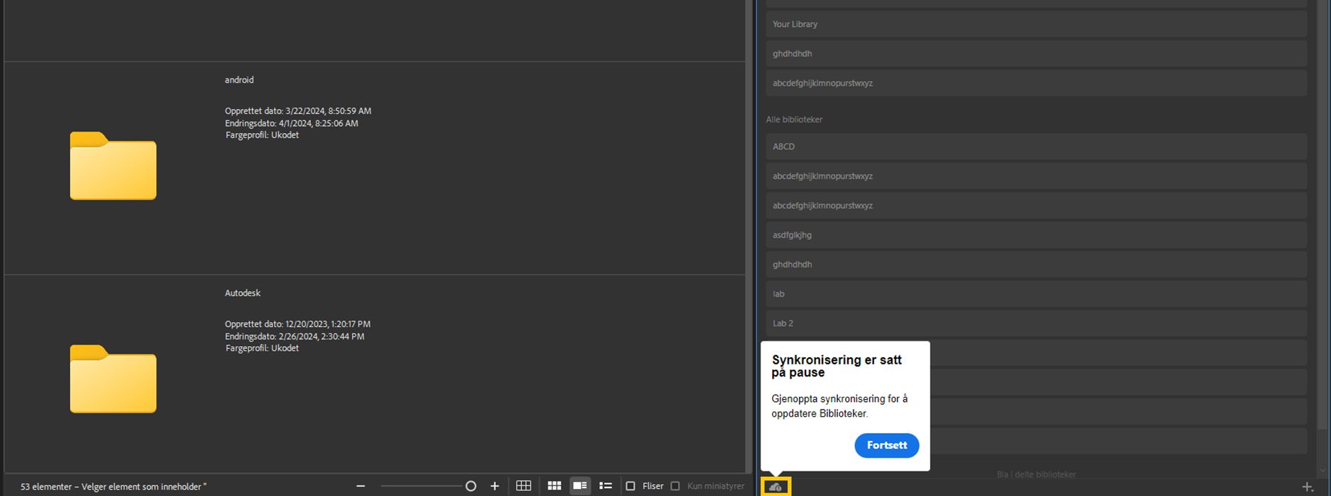 Synkronisering av bibliotek satt på pause i Adobe Bridge.