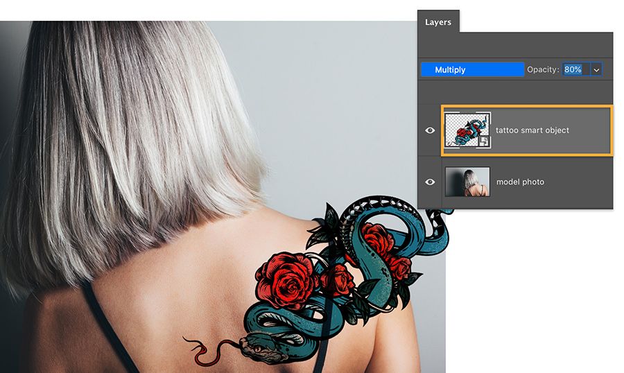เพิ่มรูปภาพศิลปะรอยสักของ Photoshop เป็นเลเยอร์ใหม่ลงในรูปภาพนางแบบและตั้งค่า Blending Mode ให้เป็น Multiply