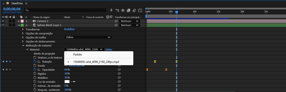 O menu suspenso de materiais está aberto em uma camada de malha esférica, listando as camadas de composição background, sample-video2.mov e textura como fontes de material, com sample-video2.mov selecionado.