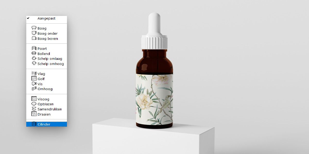 Photoshop kromtrekmenu met Cilinder geselecteerd, met een bloemen label gewikkeld om een druppelflesje.Een flesje met een druppelaar.